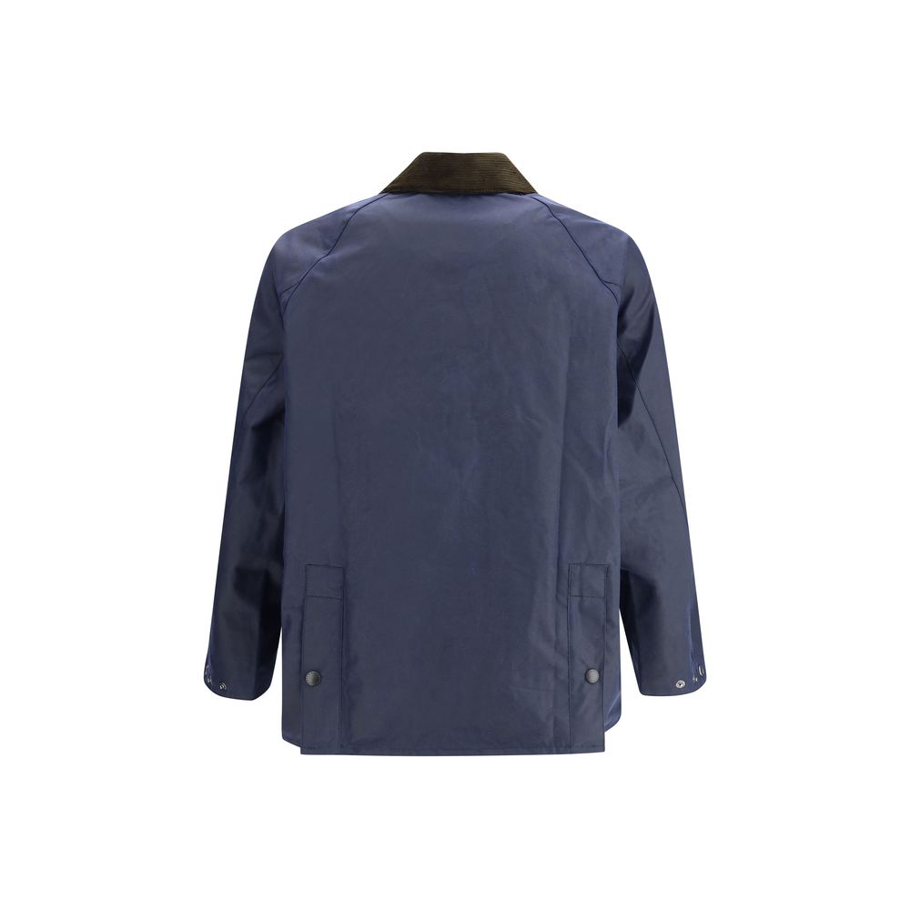 Barbour Waxed Jacket with a corded velvet collar Barbour
